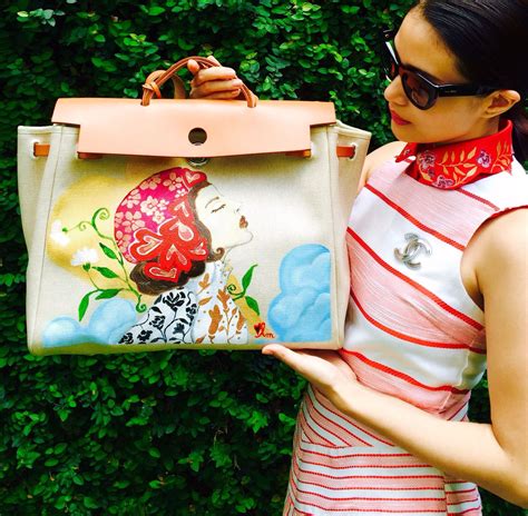 heart evangelista paintings on hermes bags